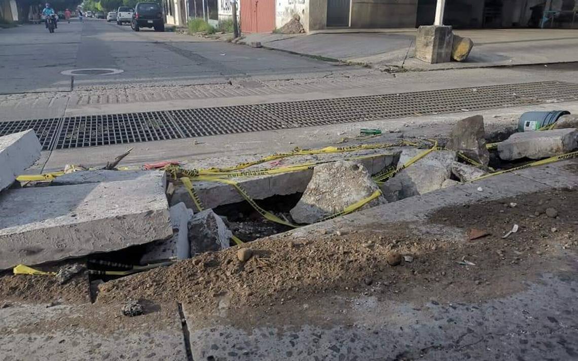 Hallan feto atorado en alcantarilla en Cuernavaca