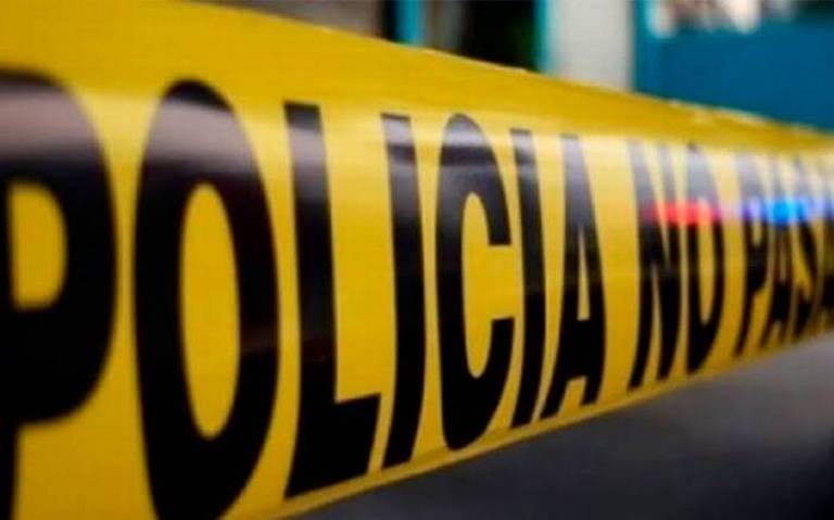 Mientras cargaba a su bebé, mujer es asesinada a balazos